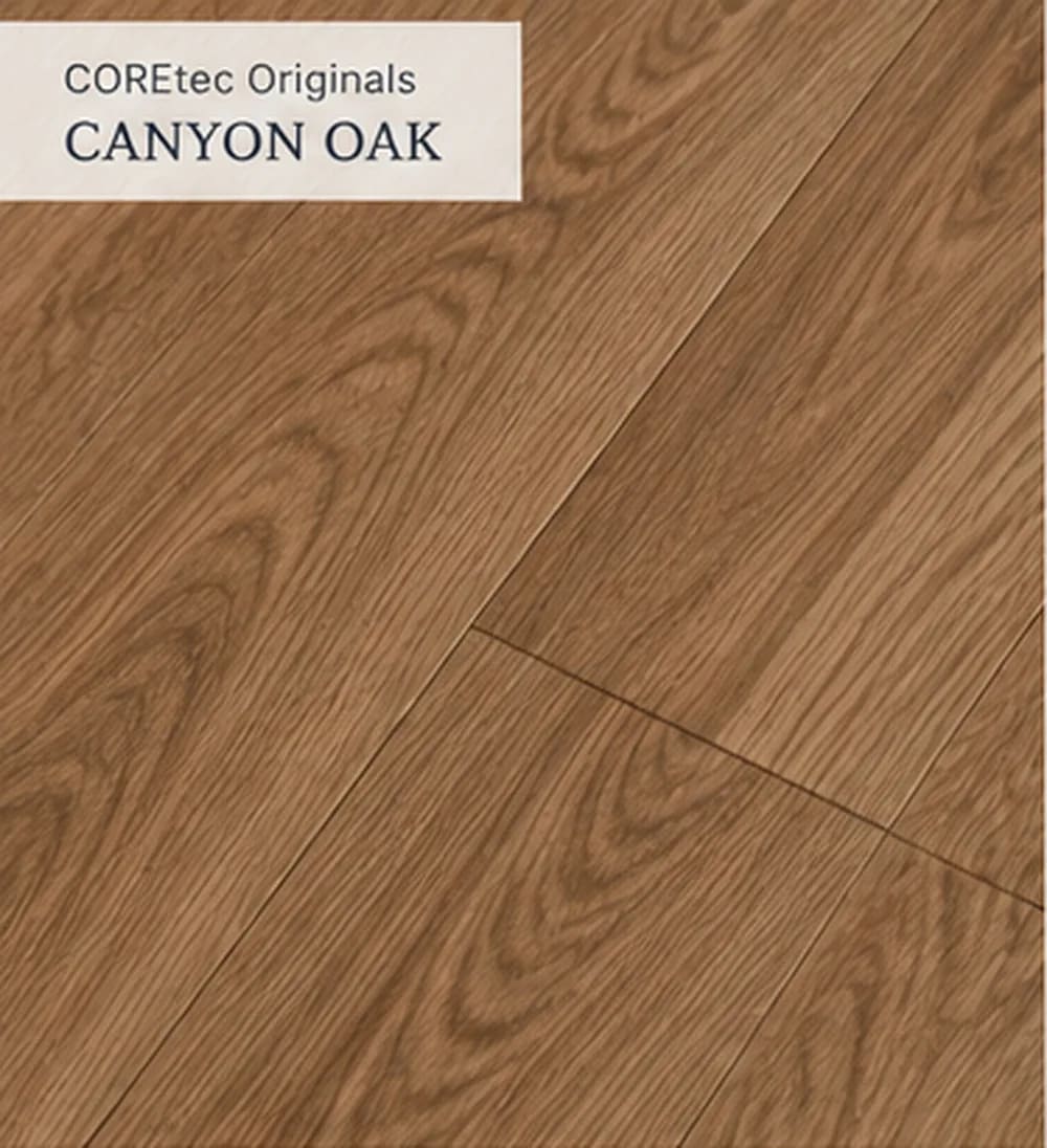 Close-up of Lakehouse Luxe in Canyon Oak, medium brown oak-look planks