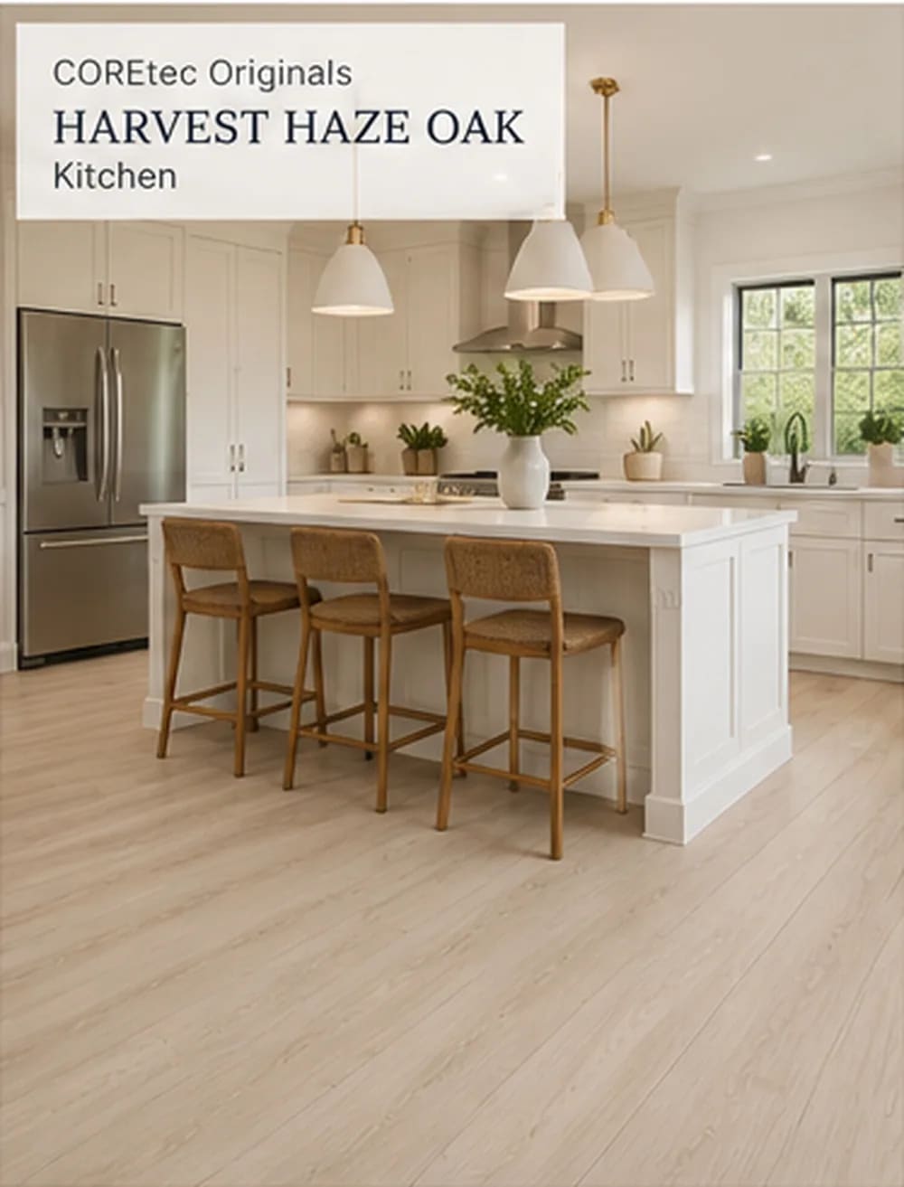 White kitchen with an island, rattan stools and a steel refrigerator on pale Harvest Haze Oak planks