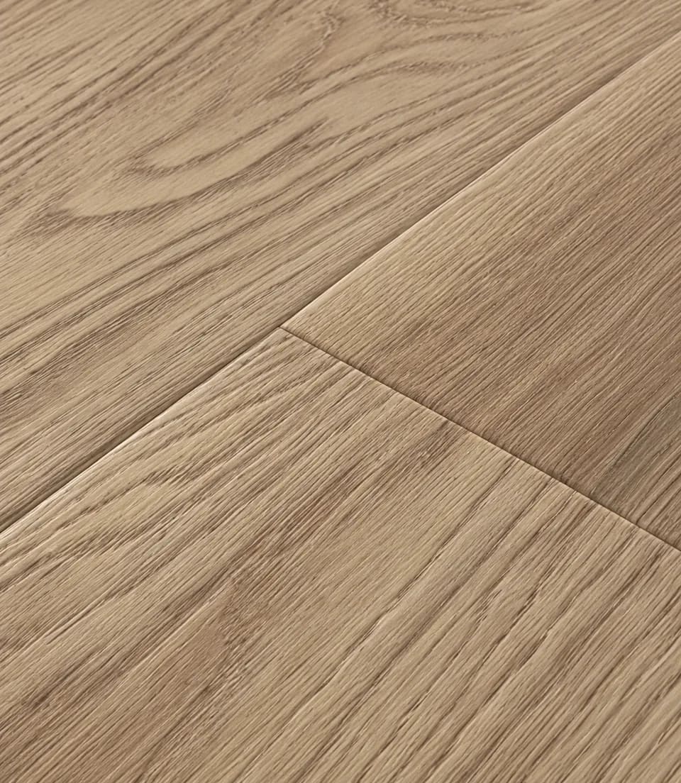 Close-up of oak-look luxury vinyl planks with embossed grain