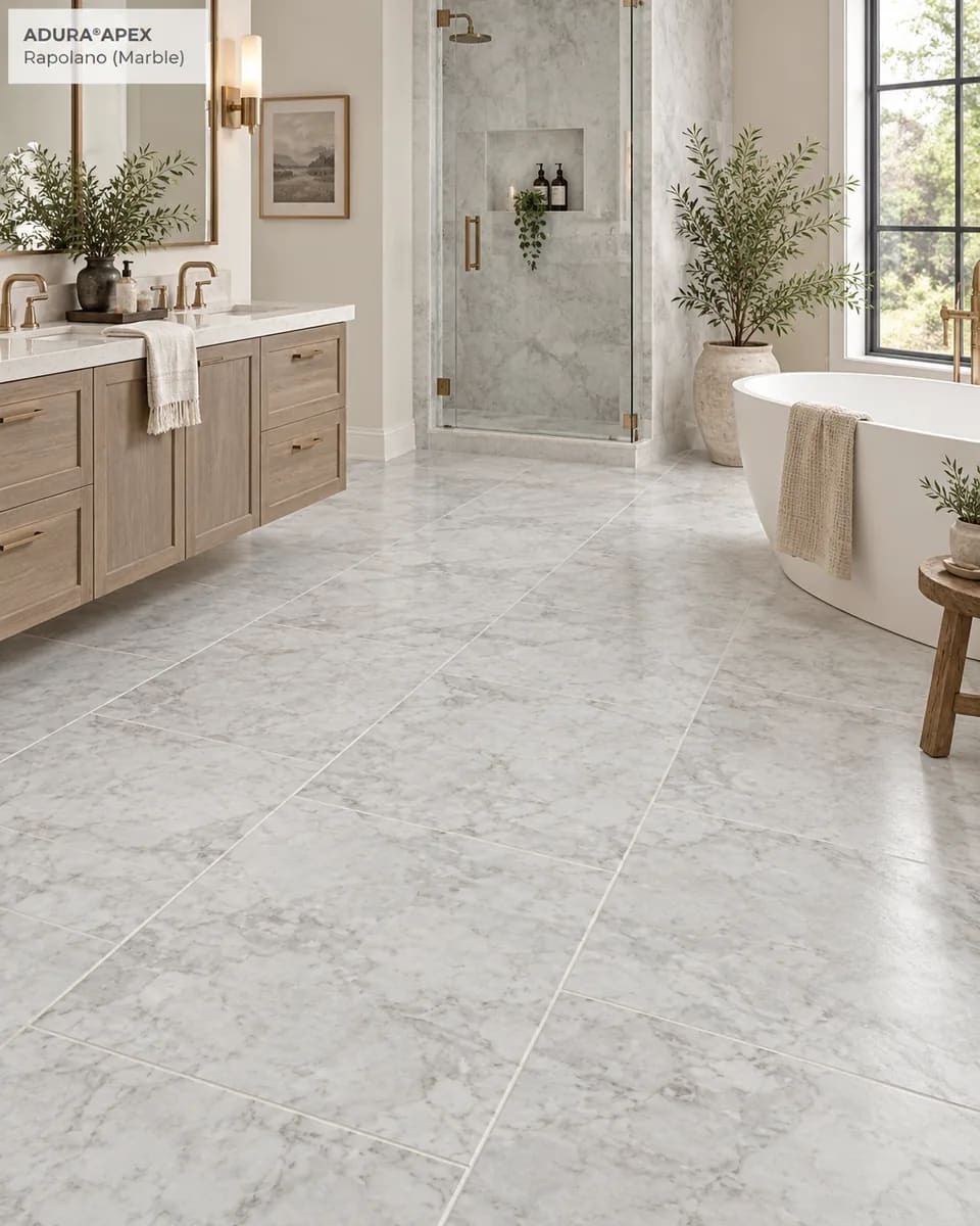 Bathroom with a glass shower, a wood vanity and a freestanding tub on pale grey Rapolano Marble tiles