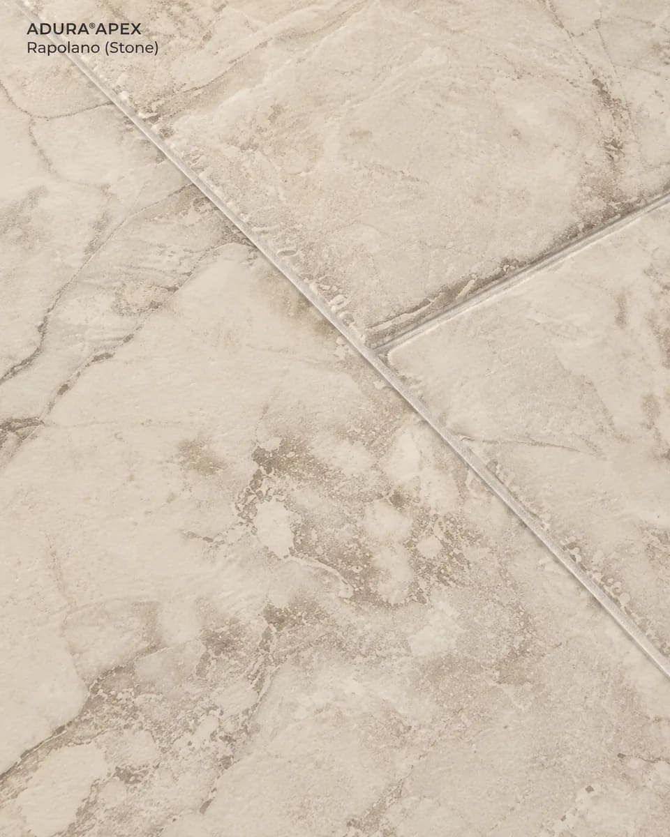 Close-up of Rapolano in Stone, beige travertine-look tiles with tumbled edges